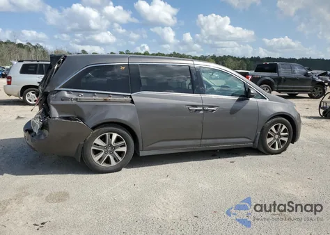 2014 Honda Odyssey Touring z USA, uszkodzony, nr VIN 5FNRL5H91EB005876
